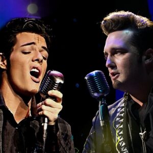 Two actors portraying Elvis Presley and Johnny Cash sing into microphones during Cash vs The King, a show playing in Medora, North Dakota