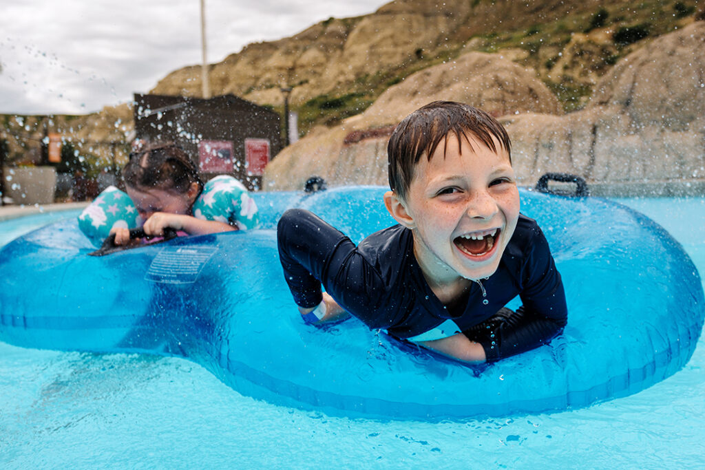 Float on the lazy river and water park at Point to Point Park in Medora, North Dakota. The pool is a great thing to do for kids and families in Medora, North Dakota