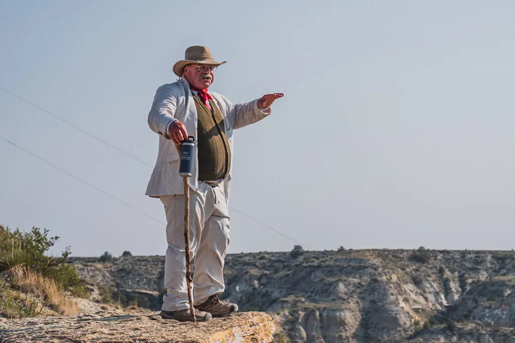 Joe Wiegand portrays Theodore Roosevelt in Medora, North Dakota on Point to Point Trails, a hiking trail in Medora, North Dakota