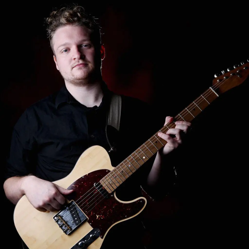 Headshot of Medora Musical guitar player Callum Murphy