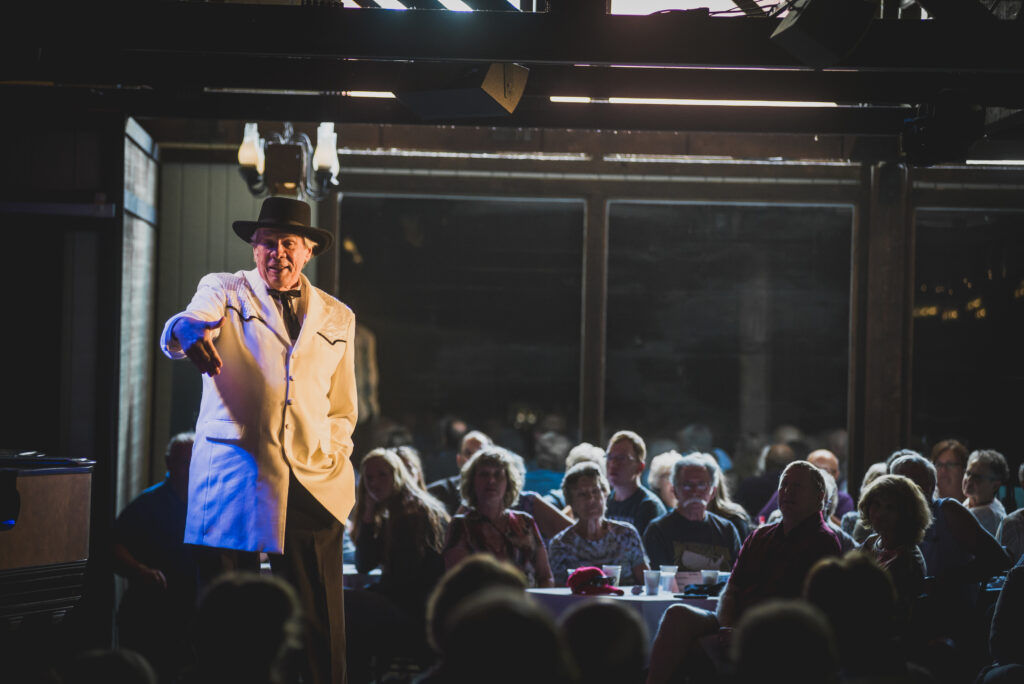 Bill Sorensen emphatically addresses the audience in the Medora Gospel Brunch.