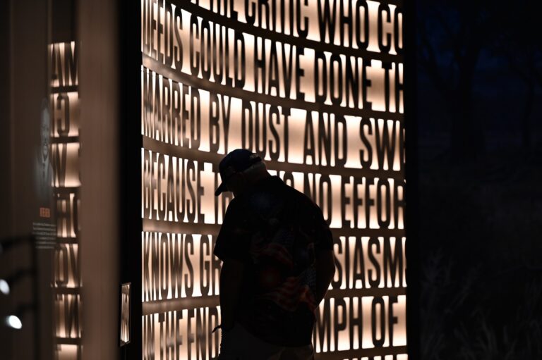 A man listening to the "In the Arena" speech.
