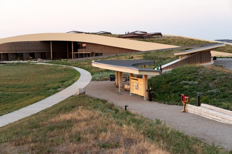 Exterior image of TRPL showcasing the walking path and swings.